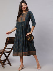 Wome Teal Blue Ethinc Printed Flared Dress With Three Quarter sleeves
