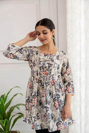 Women Off-White Printed V-Neck Peplum Tunic