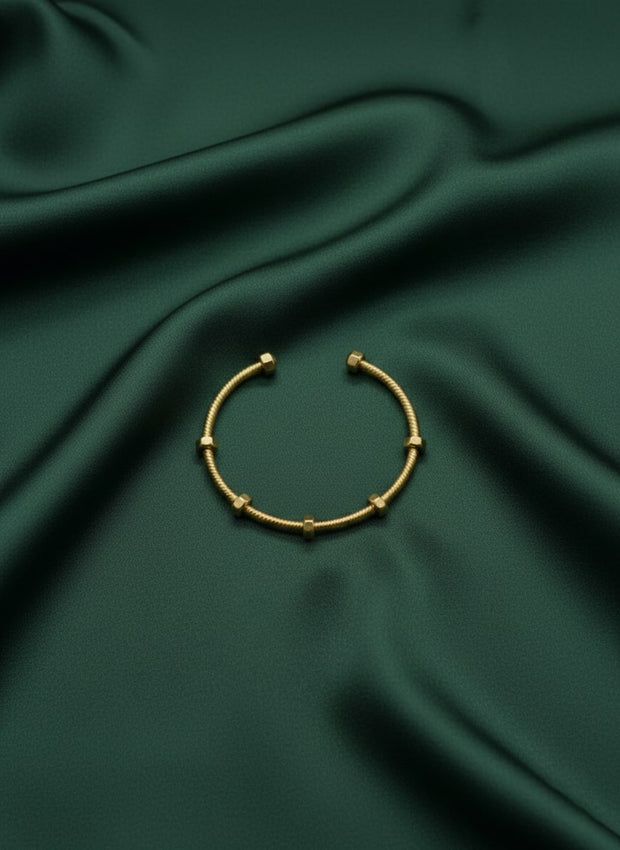 Fancy Gold Toned Cuff Bracelet