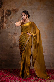 Golden Saree embellished with lace & Unstitched blouse