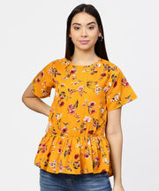 Yellow printed short sleeve with a gathered peplum style top