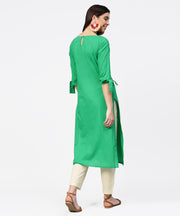 Green yoke printed half sleeve cotton kurta with cream ankle length pallazo