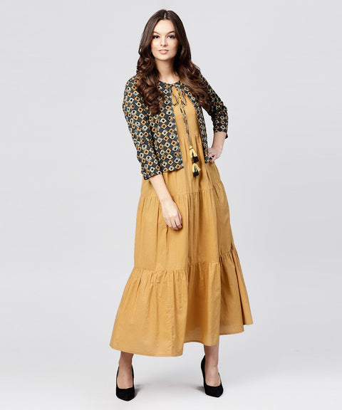 Mustard Cotton Tiered Maxi dress with Full Sleeves short jacket emblished with Tassel