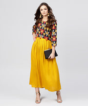 Bright Yellow rayon A-line box pleated Maxi with attached Jacket till Yoke and emblished with tassels