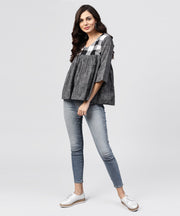 Grey top with V-neck and flared sleeves