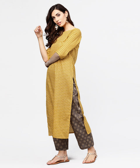 Yellow 3/4th sleeve cotton kurta with grey printed pallazo