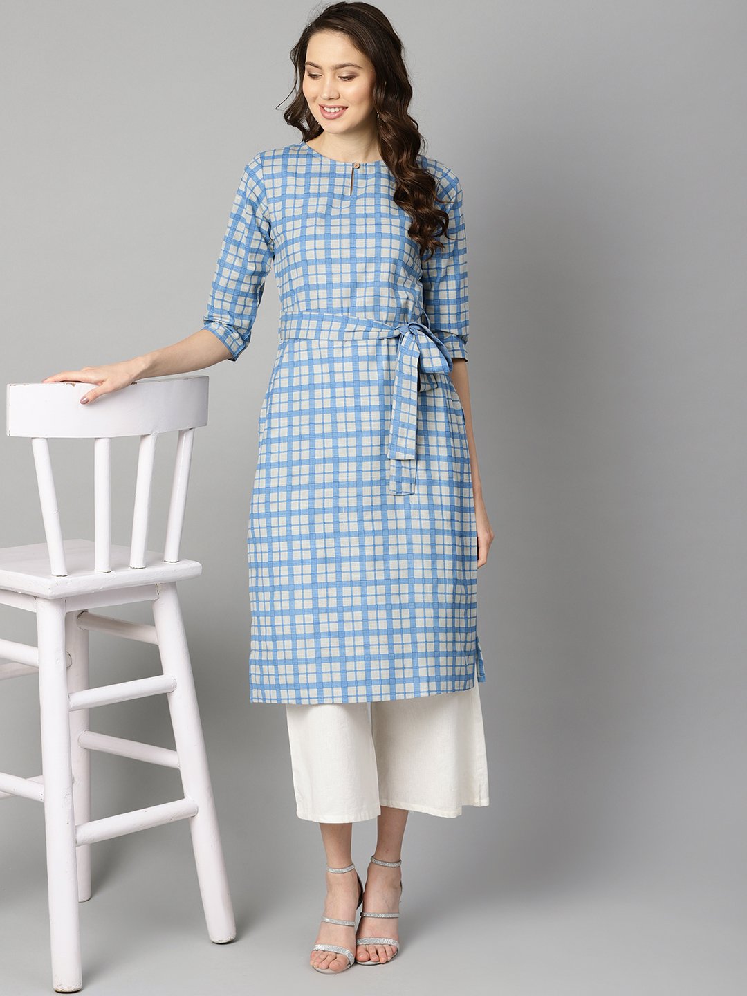 Blue colored checkered boat neck with front keyhole kurta with ...