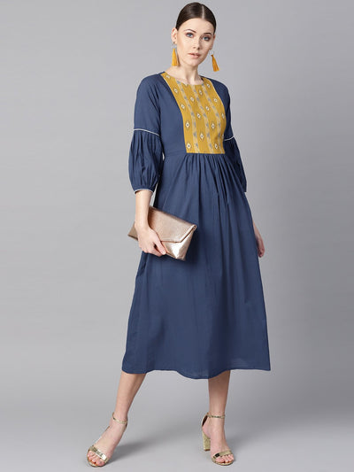 Solid Blue dress with Front Printed yoke & pleated sleeves