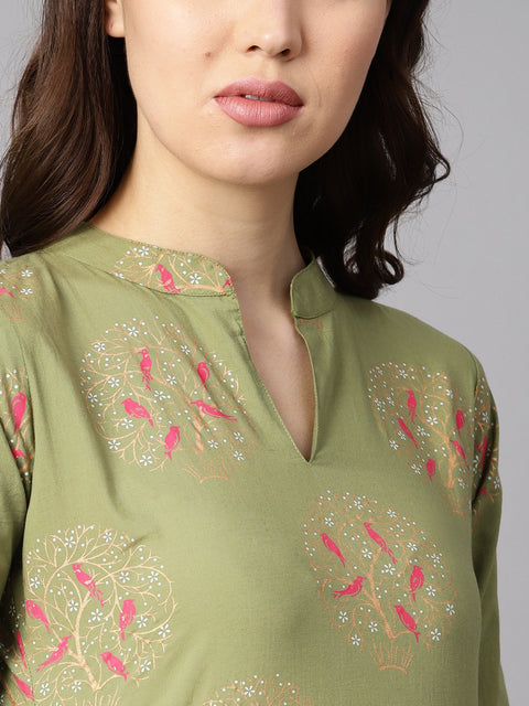 Pista green floral printed 3/4th sleeve kurta with pista green printed pants.