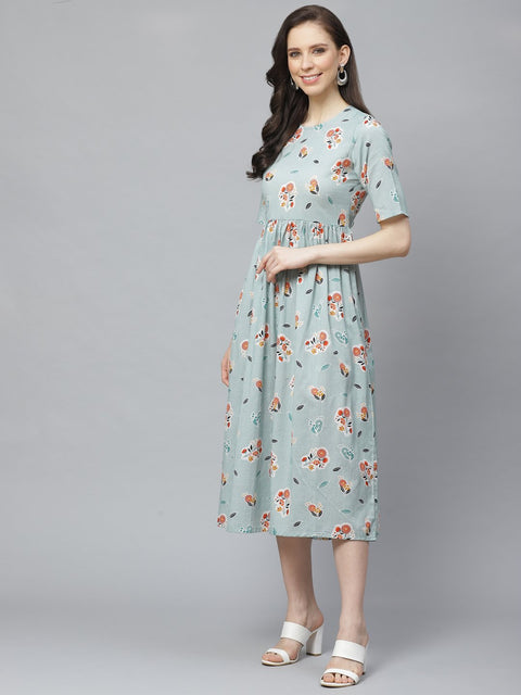 Women Turquoise Blue Floral Printed Round Neck Cotton A-Line Dress