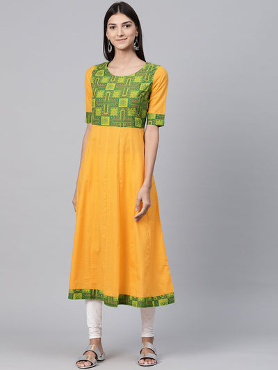 Yellow half sleeve cotton A-line kurta with printed yoke