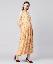 Yellow printed sleeveless rayon A-line maxi dress with button  in Yokr