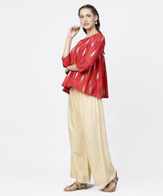 Red 3/4th sleeve short cotton flared sleeve top with beige ankle length regular fit palazzo