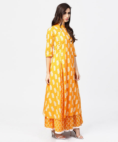 Yellow printed 3/4th sleeve cotton a-line kurta with flared ankle length skirt