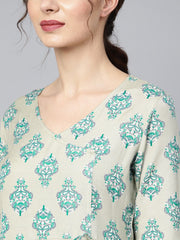 Sage green printed V-neck Angrakha style 3/4th assymetrical sleeve falred kurta with solid pants.