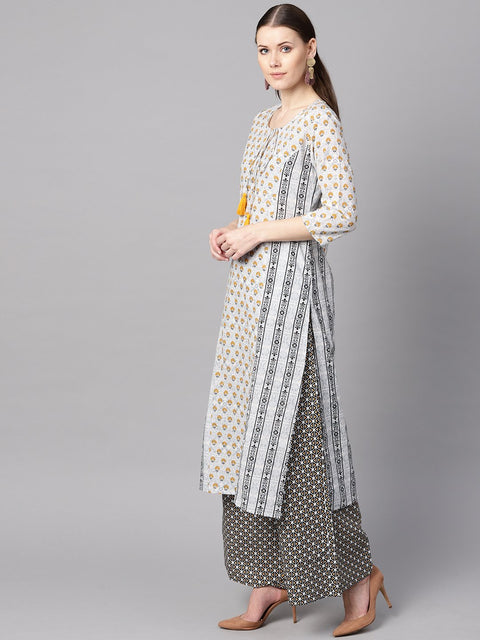 Light grey printed round neck with slit and hangings 3/4th sleeve straight panneled kurta with printed palazzo and printed dupatta.