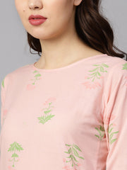 Peach printed floral round neck 3/4th sleeve straight kurta with stripped pants and printed kurta.