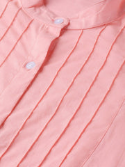 Solid pastel pink top with detailed sleeves