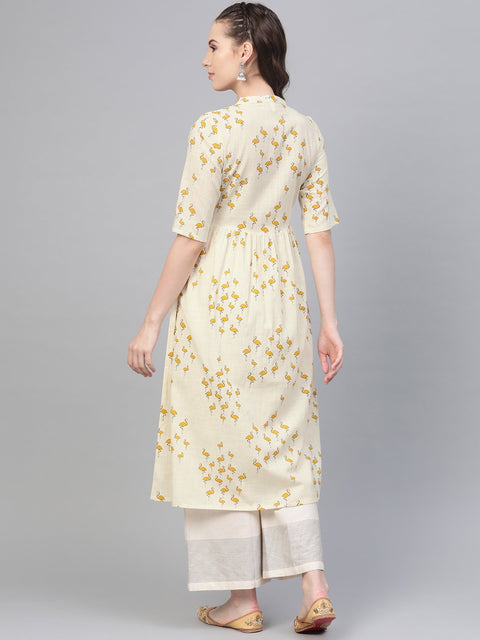 Off white and yellow ochre flamingo printed dress with a detachable belt detailing on the yoke