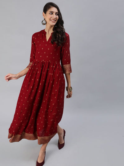 Women Maroon & Gold Printed Maxi Dress With Three Quarter Sleeves