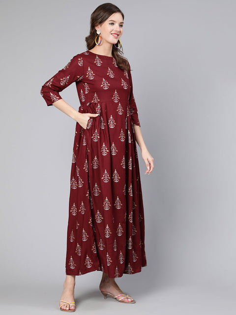 Women Burgundy Printed Flared Dress With Three Quarter Sleeves