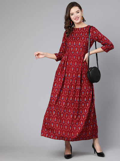 Women Maroon Printed Flared Dress With Three Quarter Sleeves