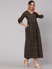 Women Green Abstrac Printed Gathered Dress With Three Quarter Sleeves