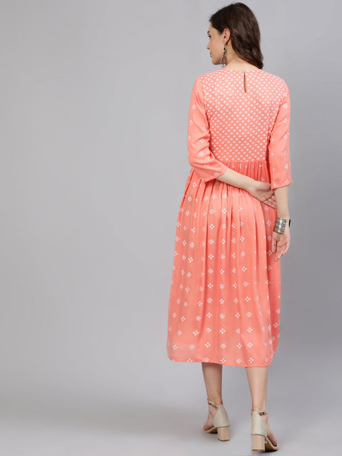 Women Peach Printed Dress With Three Quarter Sleeves
