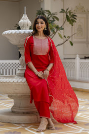 Women Red Embroidered Straight Kurta With Trouser And Net Dupatta